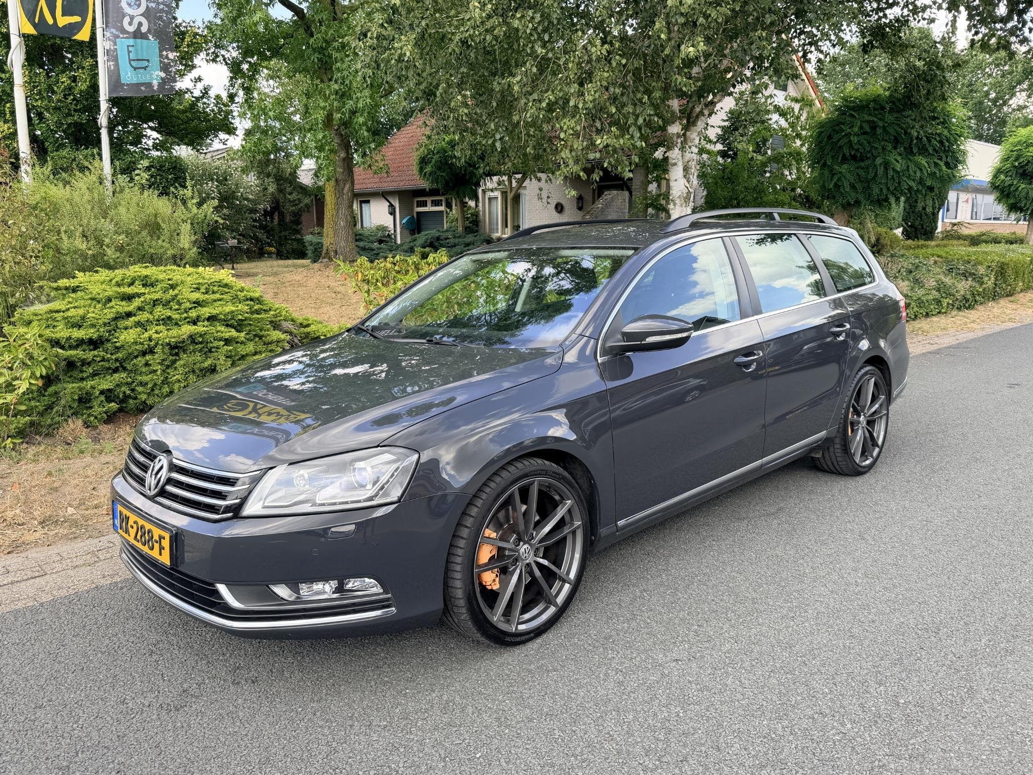 Volkswagen Passat Variant 2.0 TSI Highline 211PK DSG•Xenon, Auto's, Euro 5, Stof, Gebruikt, Zwart