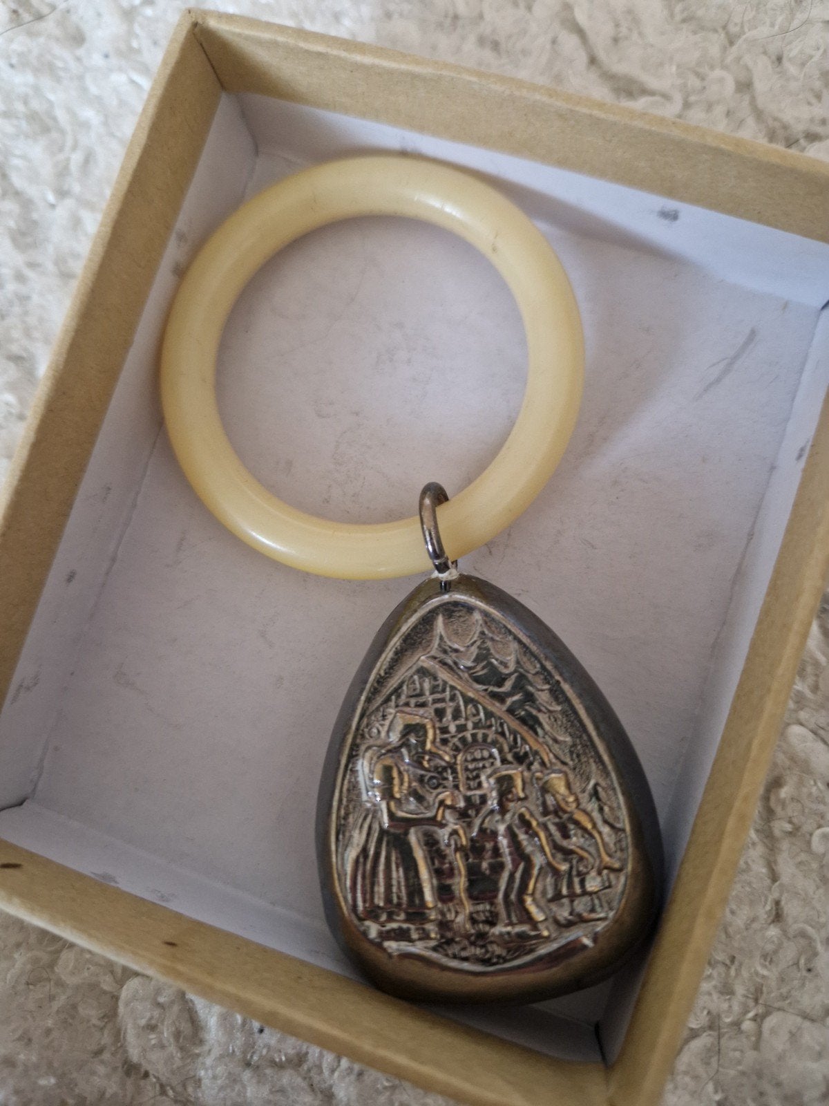 Vintage Rammelaar met Zilveren Hanger, Ophalen of Verzenden