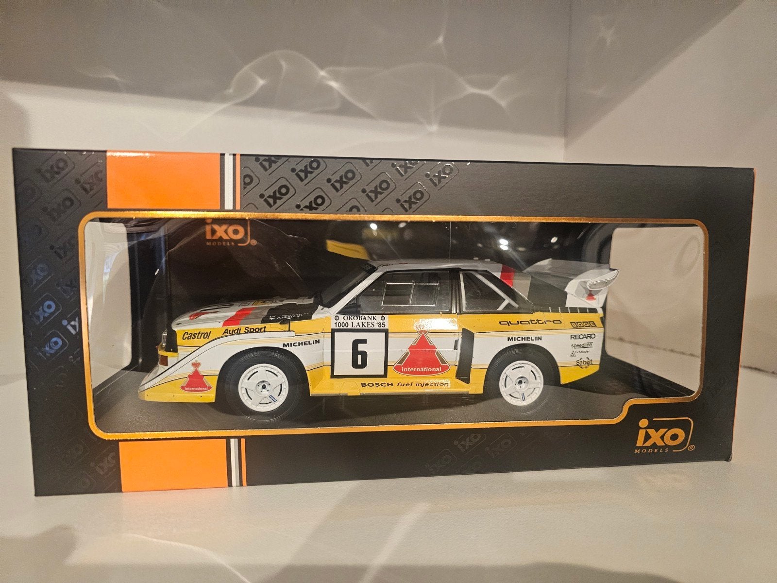 IXO Audi Sport Quattro S1 Rally 1000 Lakes 1985 1:18, Ophalen of Verzenden, Zo goed als nieuw, Auto, Overige merken