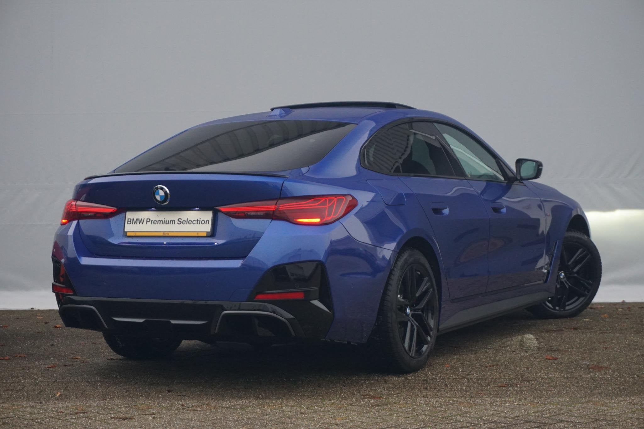 BMW i4 Gran Coupé eDrive40 M Sportpakket Pro | Schuif-/kant, Auto's, Lichtsensor, Achterwielaandrijving, 510 min, Met garantie (alle)
