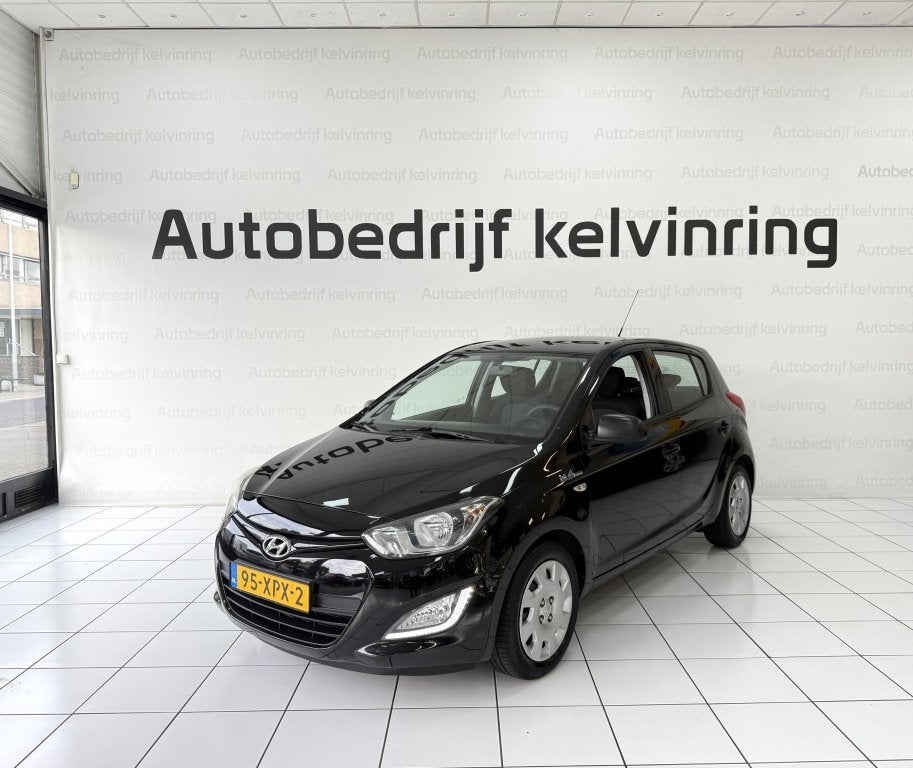 Hyundai i20 1.2i Business Ed Bovag garantie NAP Airco, Auto's, Gebruikt, 31 €/maand, 4 cilinders, Zwart