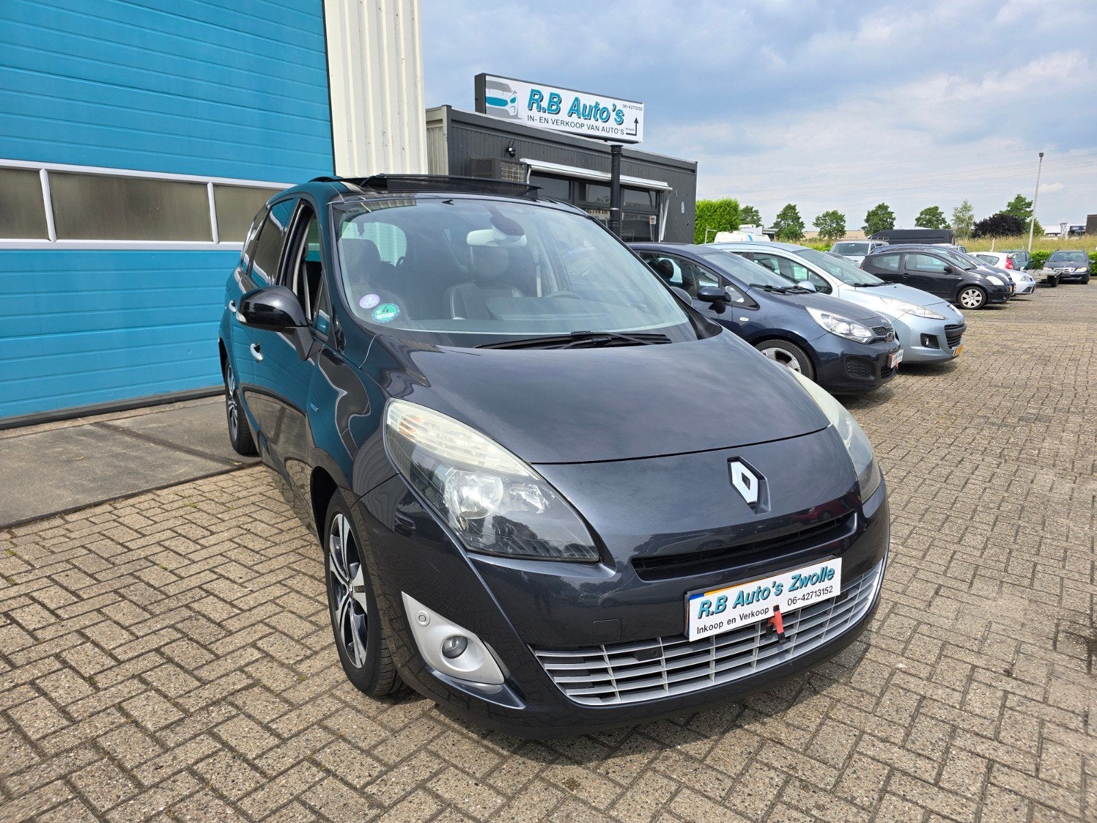 Renault Grand Scenic 2.0 16V 103KW CVT 5P 2011 Grijs Netjes, Auto's, Renault, Euro 5, Zwart, 4 cilinders, Leder en Stof