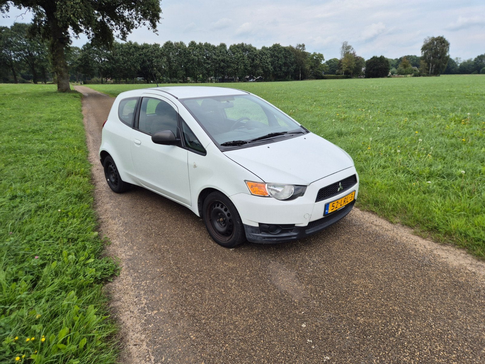 Mitsubishi Colt 1.1 Mivec CZ3 2010 Wit, Voorwielaandrijving, Dealer onderhouden, Stof, 74 pk