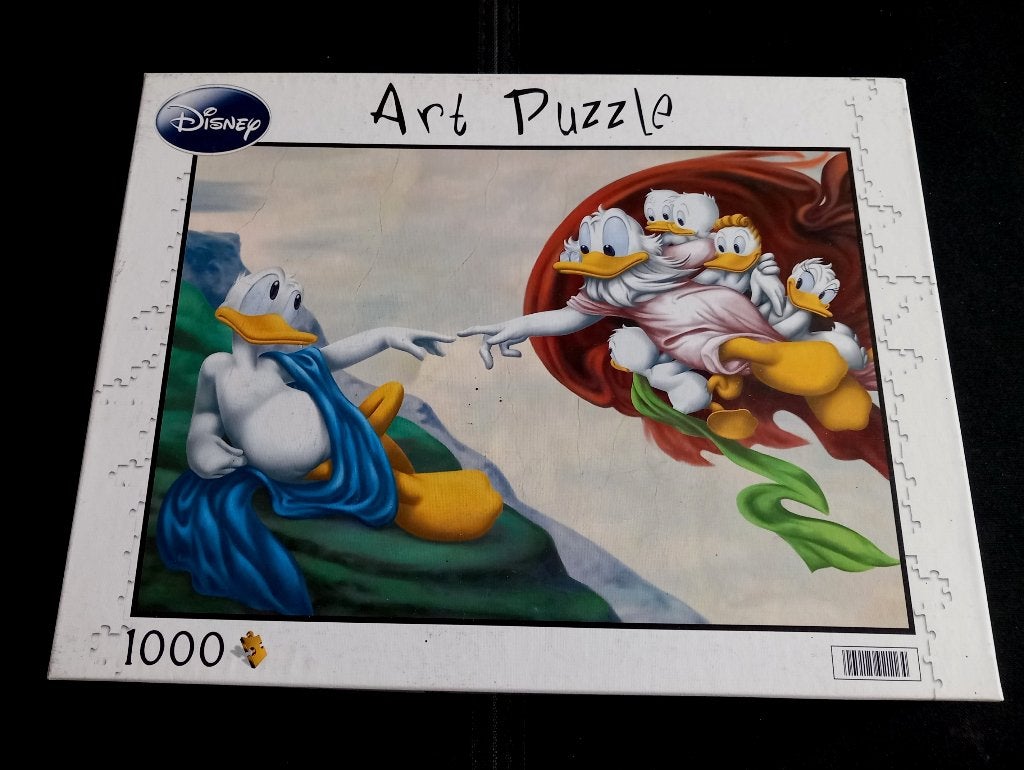 Disney-Art puzzel van 1000 stukjes The Creation of Donald, Ophalen of Verzenden, 500 t/m 1500 stukjes, Zo goed als nieuw, Legpuzzel