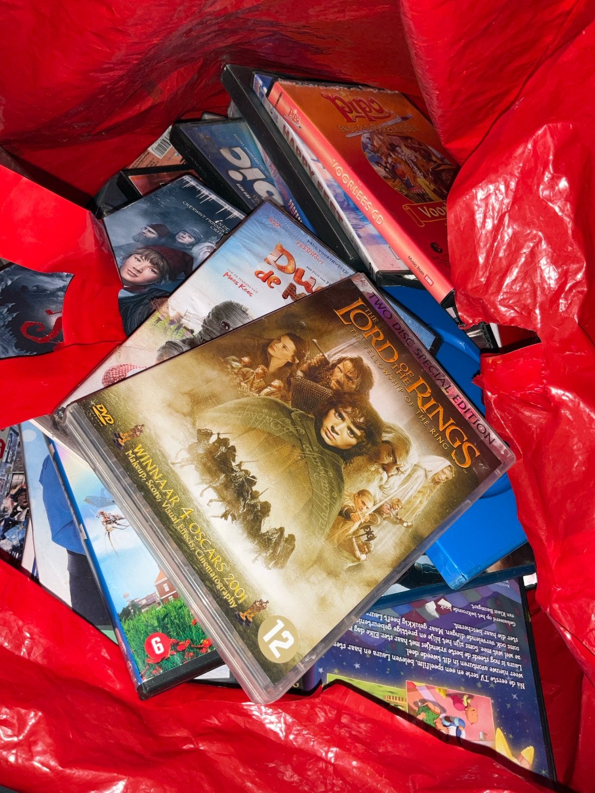 Grote tas vol diverse DVD's - Films en meer, Nederlands, Ophalen of Verzenden, Vanaf 12 jaar, Inclusief doosje