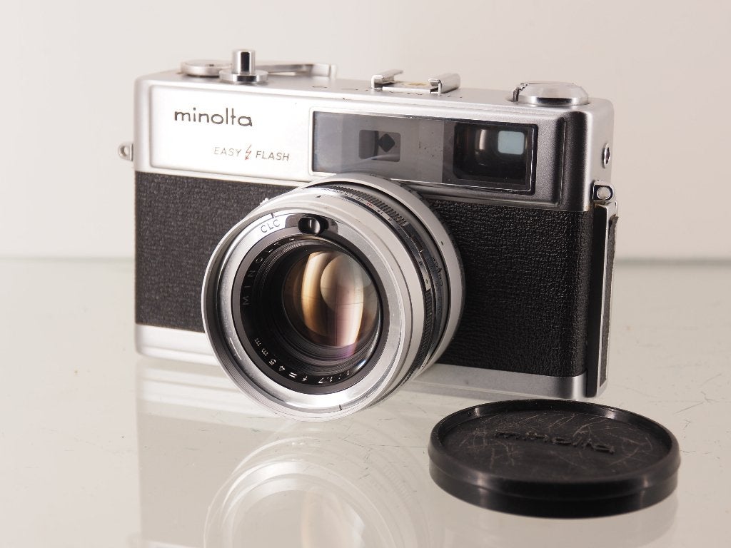 Minolta Hi-Matic 9 – DEFECT / Voor onderdelen / LEES TEKST, Audio, Tv en Foto, Ophalen of Verzenden, Niet werkend, Compact, Minolta
