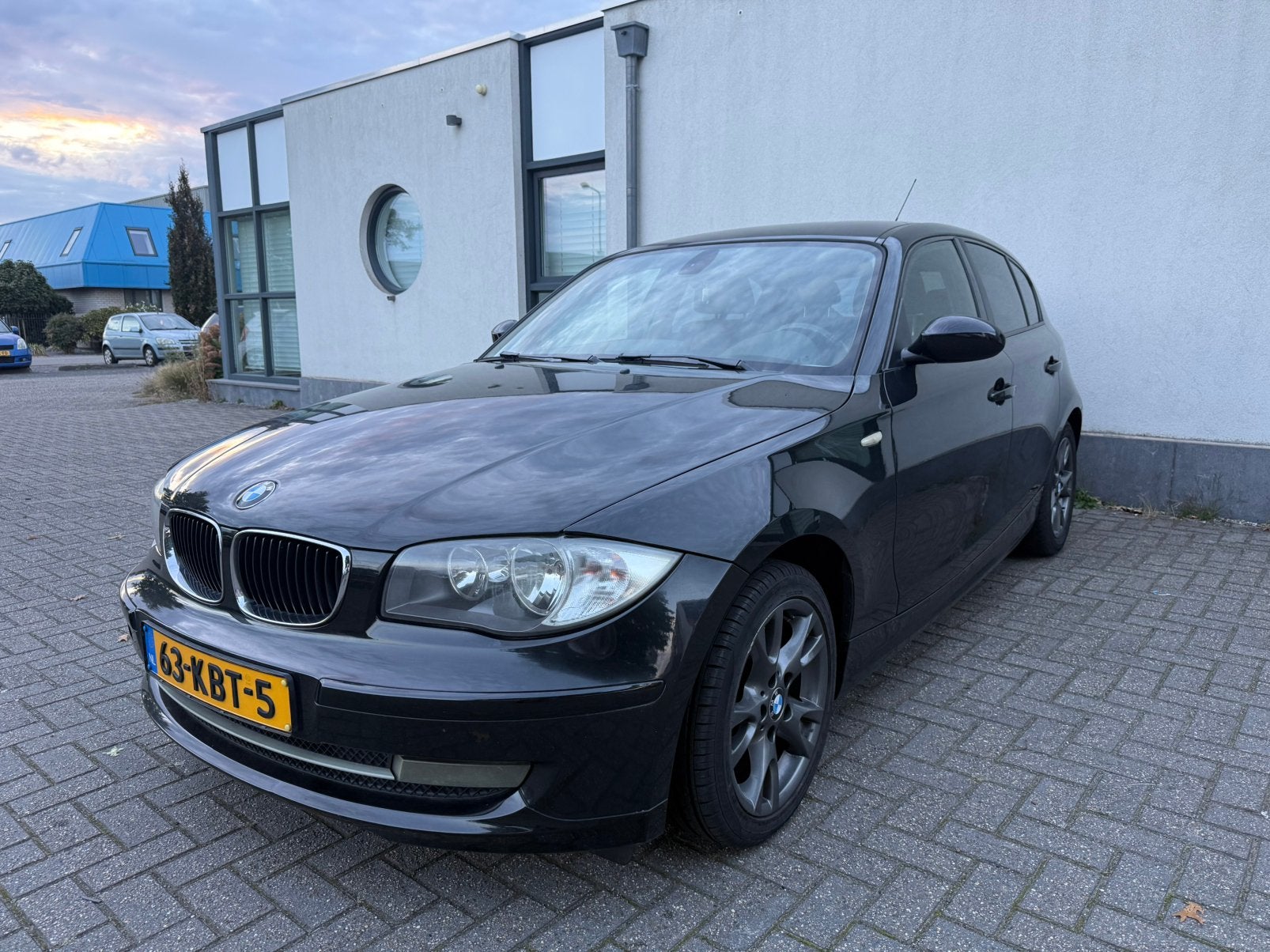 BMW 1-Serie 1.6 116I 5DR 2009 Zwart Airco/Navi/Apk!, 1-Serie, 4 cilinders, Origineel Nederlands, Onderhoudsboekje
