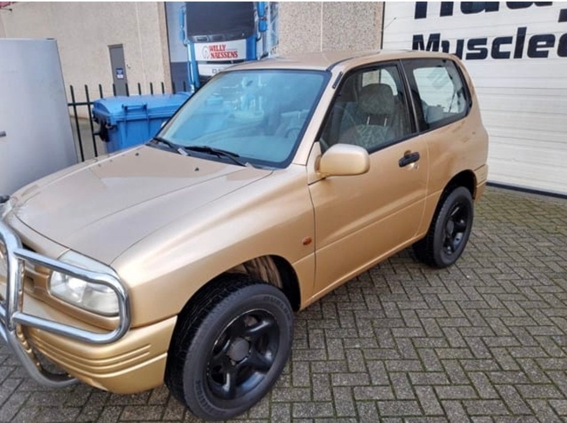 Suzuki Grand Vitara 2.0 4x4 3D 1999 Geel, Auto's, 1995 cc, 4 cilinders, Handgeschakeld, Vierwielaandrijving