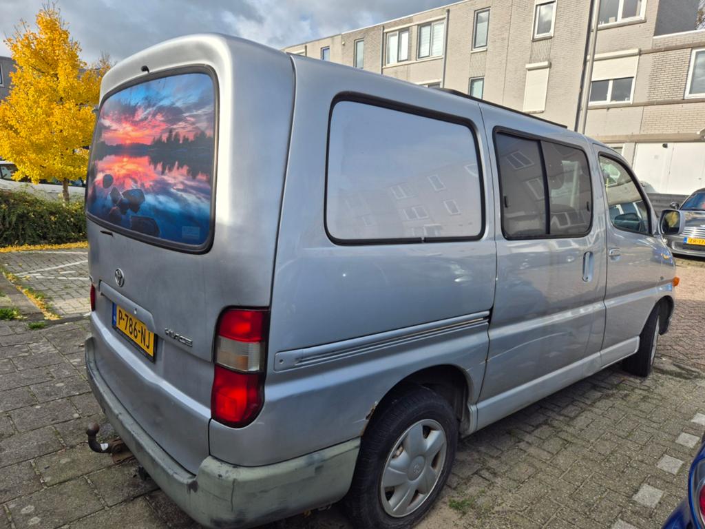 Toyota HiAce 2004 Grijs, Auto's, Toyota, Particulier, Diesel, Origineel Nederlands, Zilver of Grijs, Ophalen