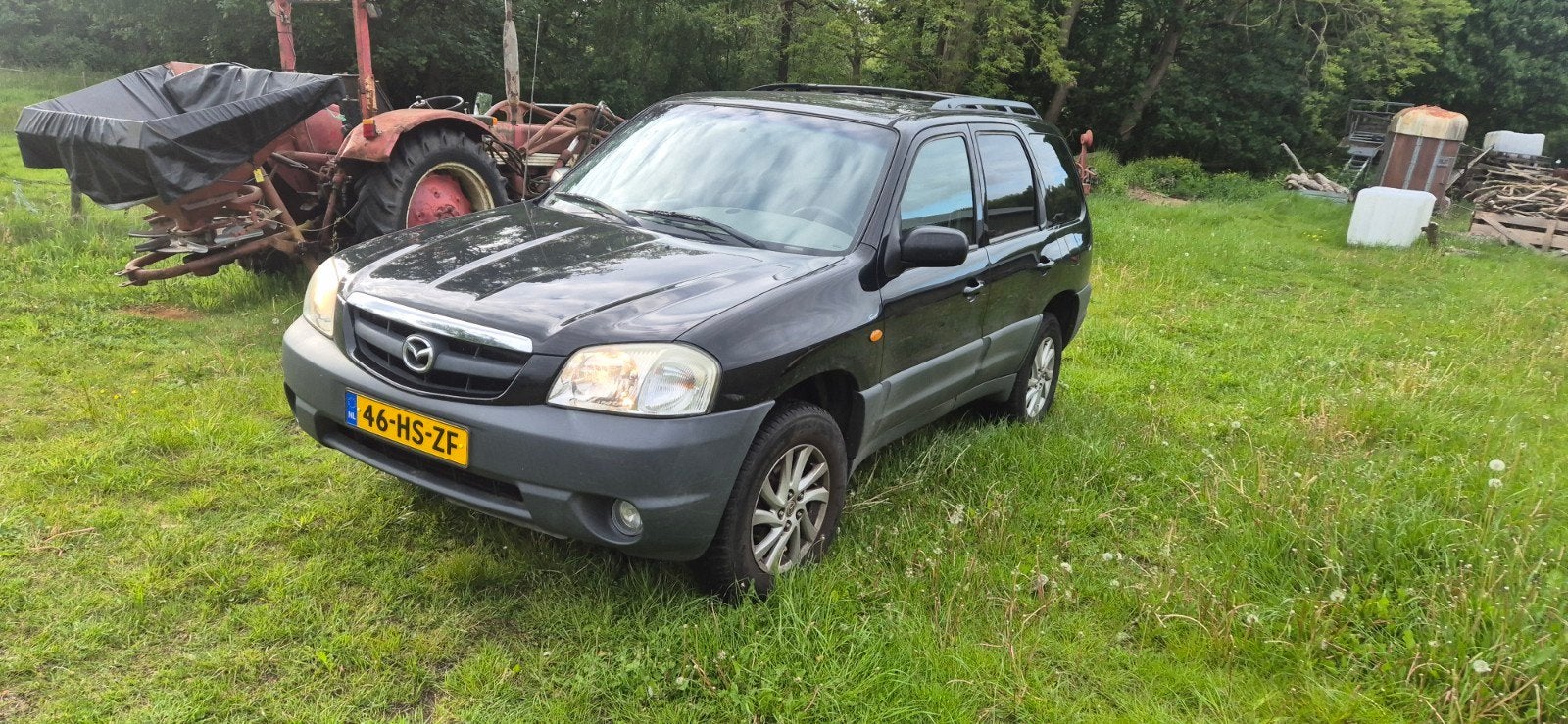 Mazda Tribute 2.0 Exclusive 4WD 2001 Zwart, Auto's, Mazda, 745 kg, 1989 cc, 4 cilinders, Zwart