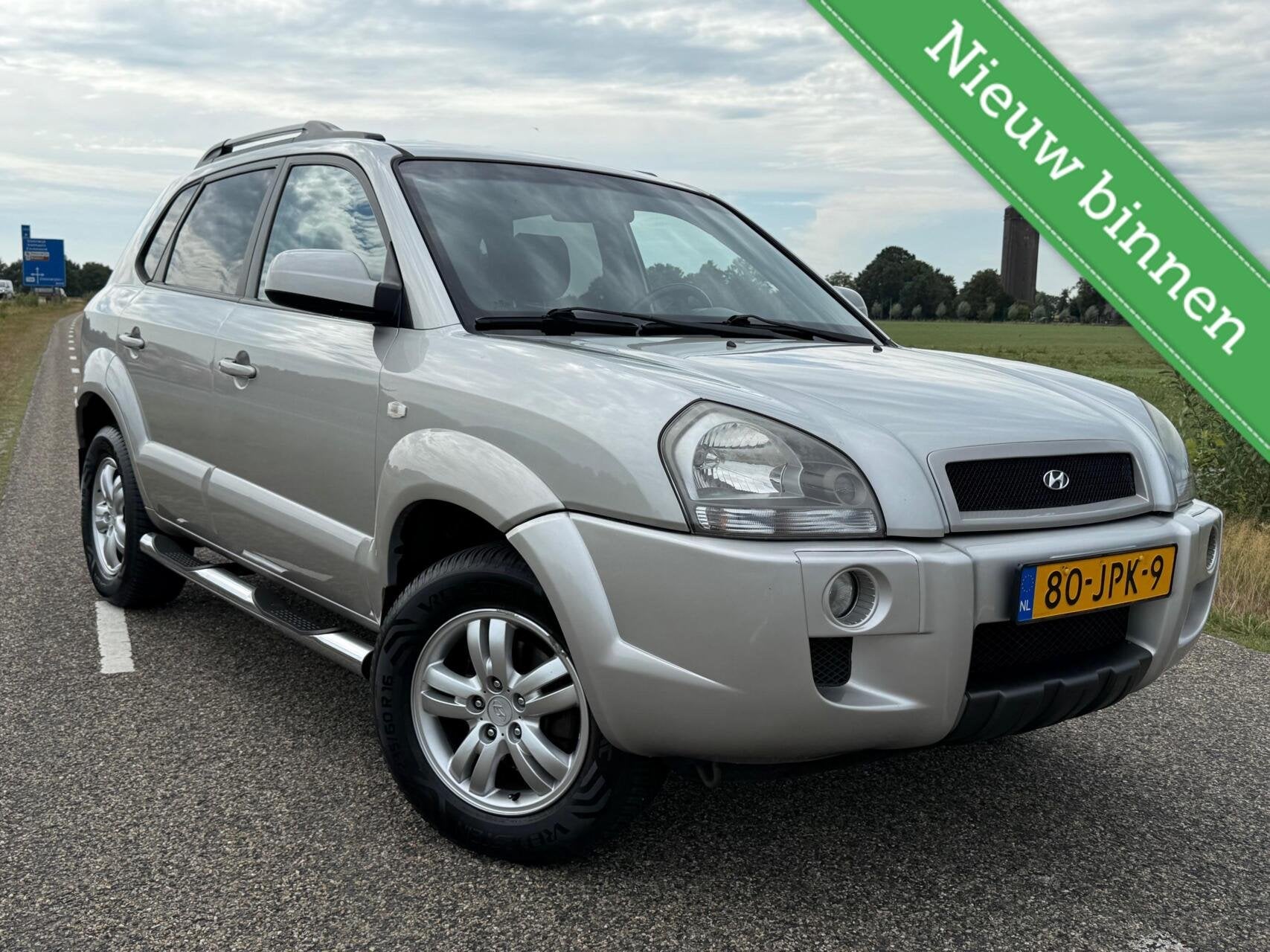 Hyundai Tucson 2.0i Style Supreme 141pk | Orig NL, Auto's, Stof, Gebruikt, Zwart, 4 cilinders