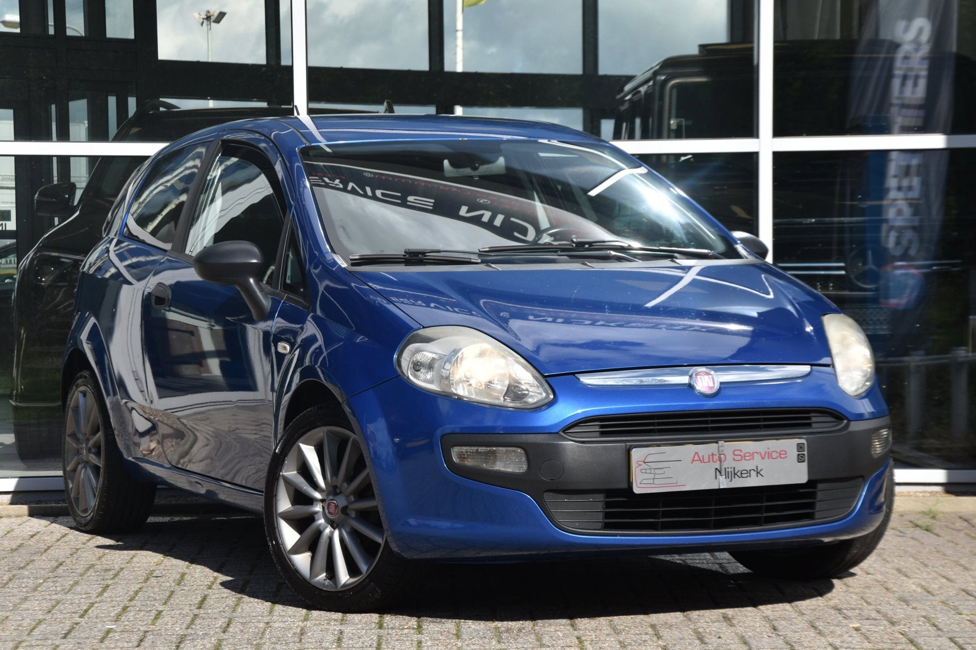 Fiat Punto Evo 1.4 Business | Airco | Bluetooth | LMV | Nieu, Voorwielaandrijving, Metallic lak, Stof, Gebruikt