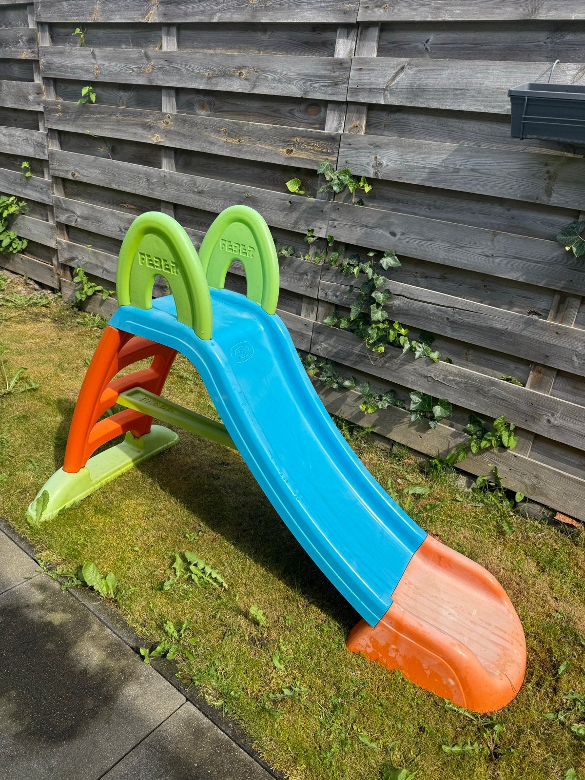 Feber glijbaan in goede staat, Ophalen, Zo goed als nieuw