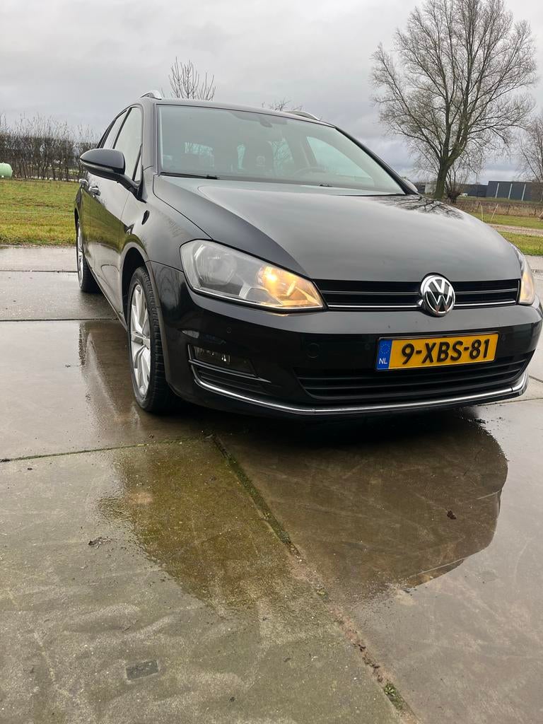 Volkswagen Golf 1.2 TSI 77KW/105PK Var. Aut7 2014 Zwart, Auto's, Euro 5, Zwart, 4 cilinders, Leder en Stof