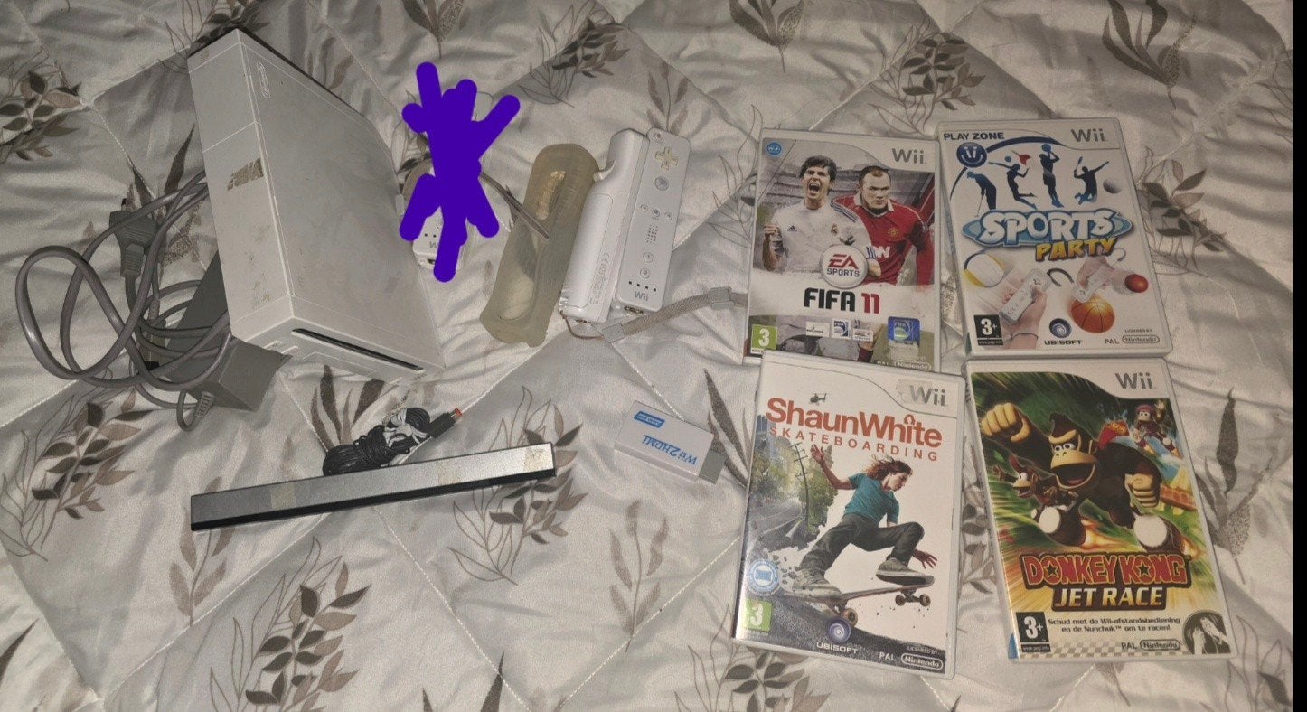 nintendo Wii met 2 controllers, Balance Board en games, Ophalen of Verzenden, Gebruikt, Met 2 controllers, Met games