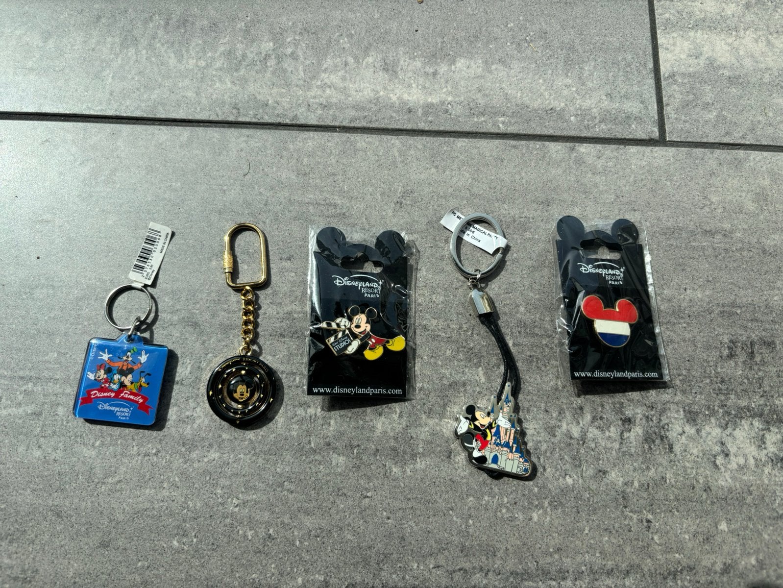 Disney sleutelhangers en bittons, Ophalen of Verzenden, Mickey Mouse, Nieuw