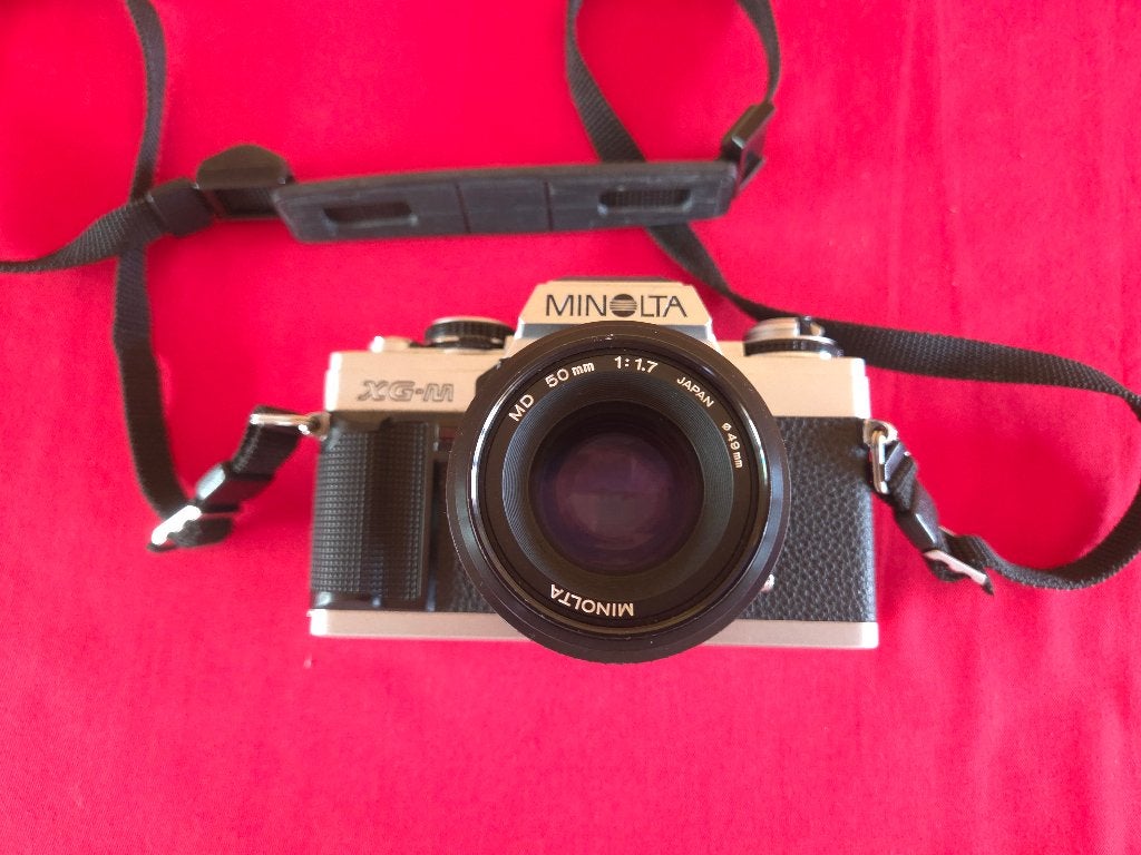 Minolta XG-M + MD 50mm f/1.7 Lens & Filter volledig getest, Ophalen of Verzenden, Gebruikt, Spiegelreflex, Minolta