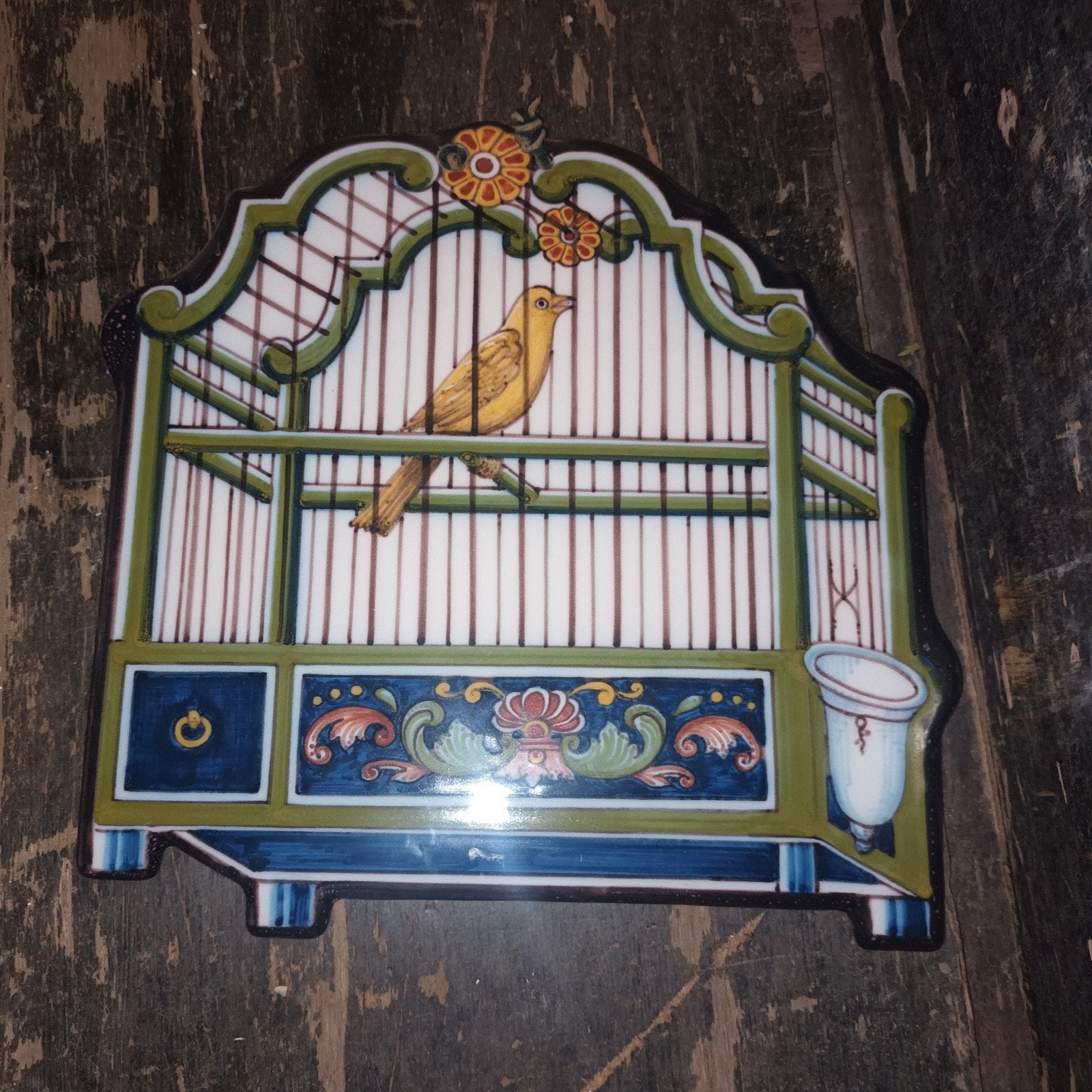 Decoratieve Wandtegel: Kanarie in Kooitje, Ophalen