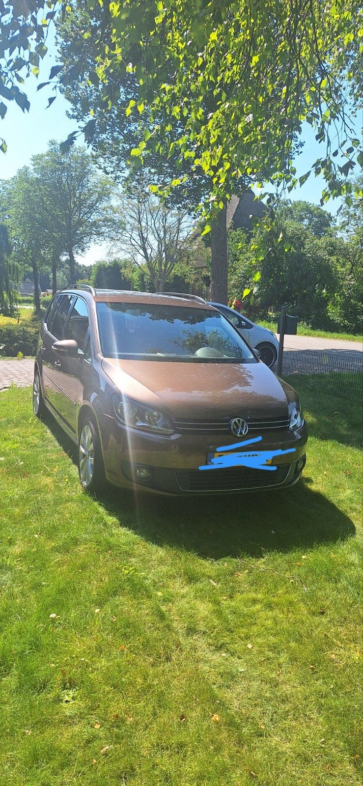 Volkswagen Touran 1.2 TSI 77KW BMT 7P 2011 Bruin, Auto's, Volkswagen, Voorwielaandrijving, Stof, 4 cilinders, Bruin