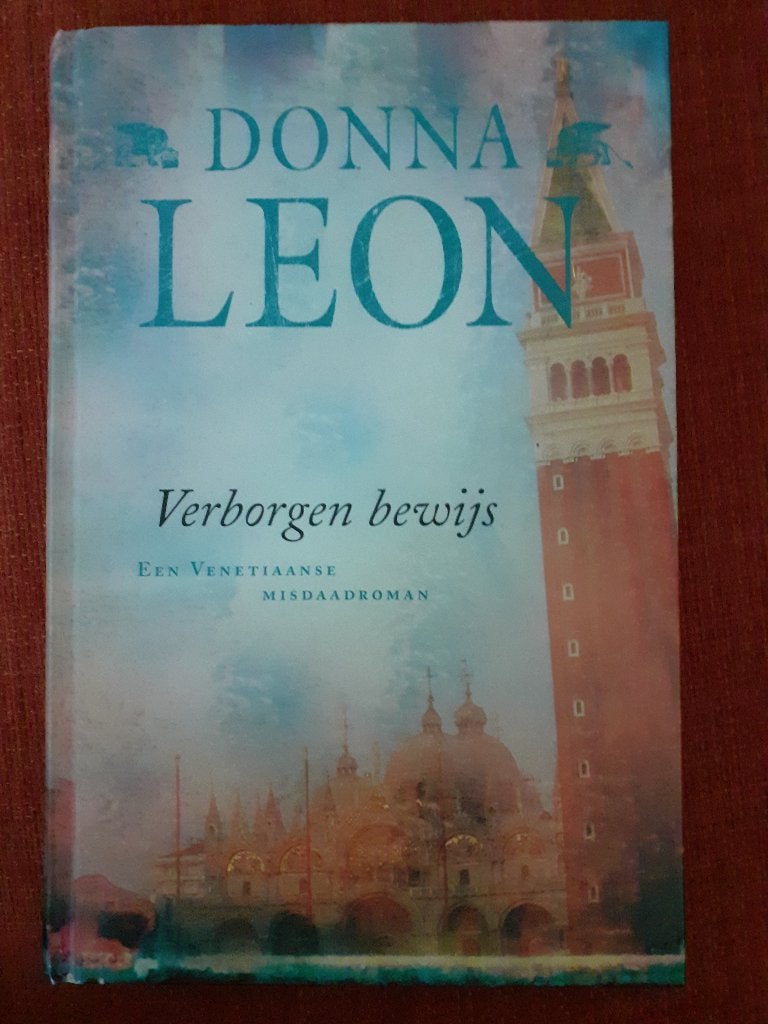 Boek ‘Verborgen bewijs ’ van Donna Leon, Europa overig, Donna Leon, Ophalen of Verzenden, Zo goed als nieuw