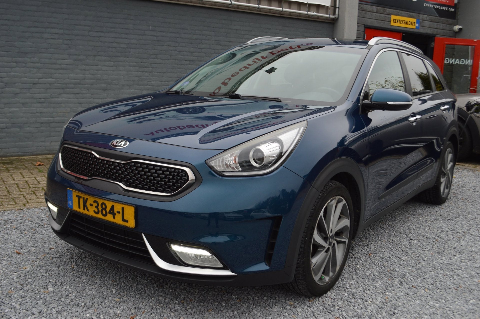 Kia Niro 1.6 GDi Hybrid Design Edition | Airco | Leer | Navi, Auto's, Gebruikt, Euro 6, Blauw, Leder en Stof