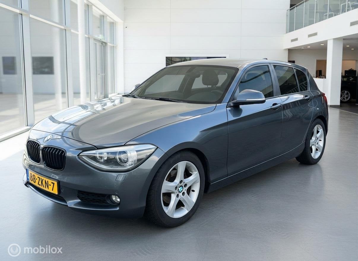 BMW 1-serie 114i EDE Business+Airco|Leder|Xenon, Auto's, 1-Serie, Euro 5, Achterwielaandrijving, Gebruikt