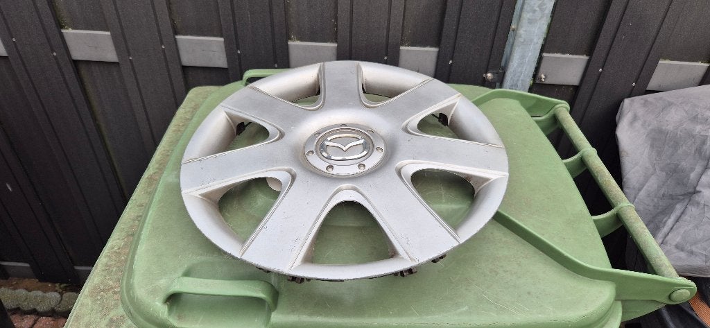 wieldoppen 4 stuks mazda, Auto diversen, Ophalen of Verzenden, Gebruikt