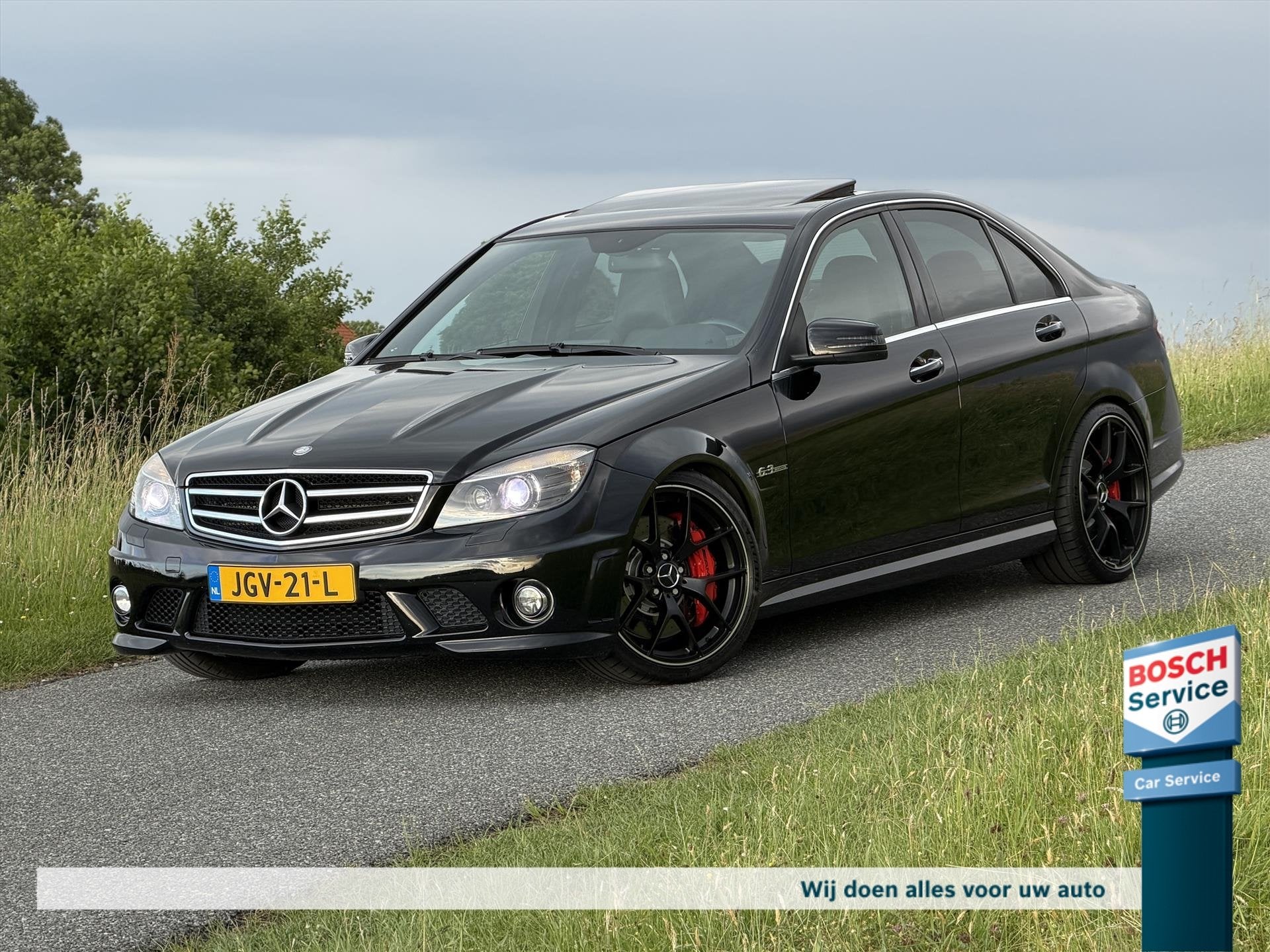 Mercedes C-Klasse C63 AMG 457PK / Schuif-kantel dak / Keyles, Auto's, Mercedes-Benz, Automaat, Euro 5, 8 cilinders, Zwart