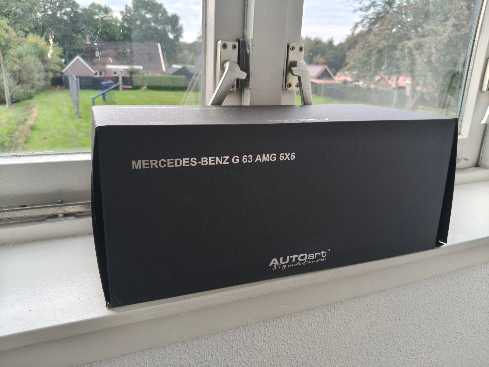 Autoart Mercedes Benz G AMG 6x6, Hobby en Vrije tijd, Ophalen of Verzenden, Zo goed als nieuw, Autoart