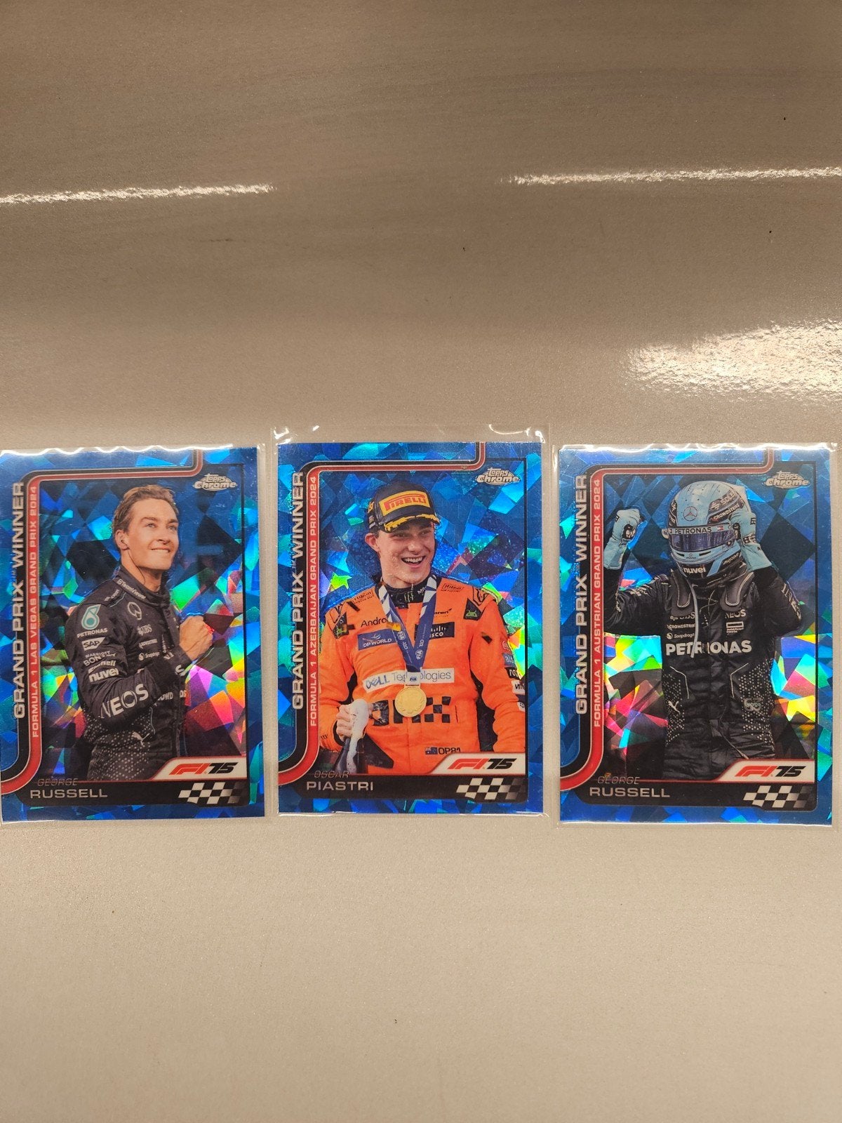 Topps chrome f1 2025 sapphire russel piastri grand prix winn, Ophalen of Verzenden, Nieuw, Plaatje