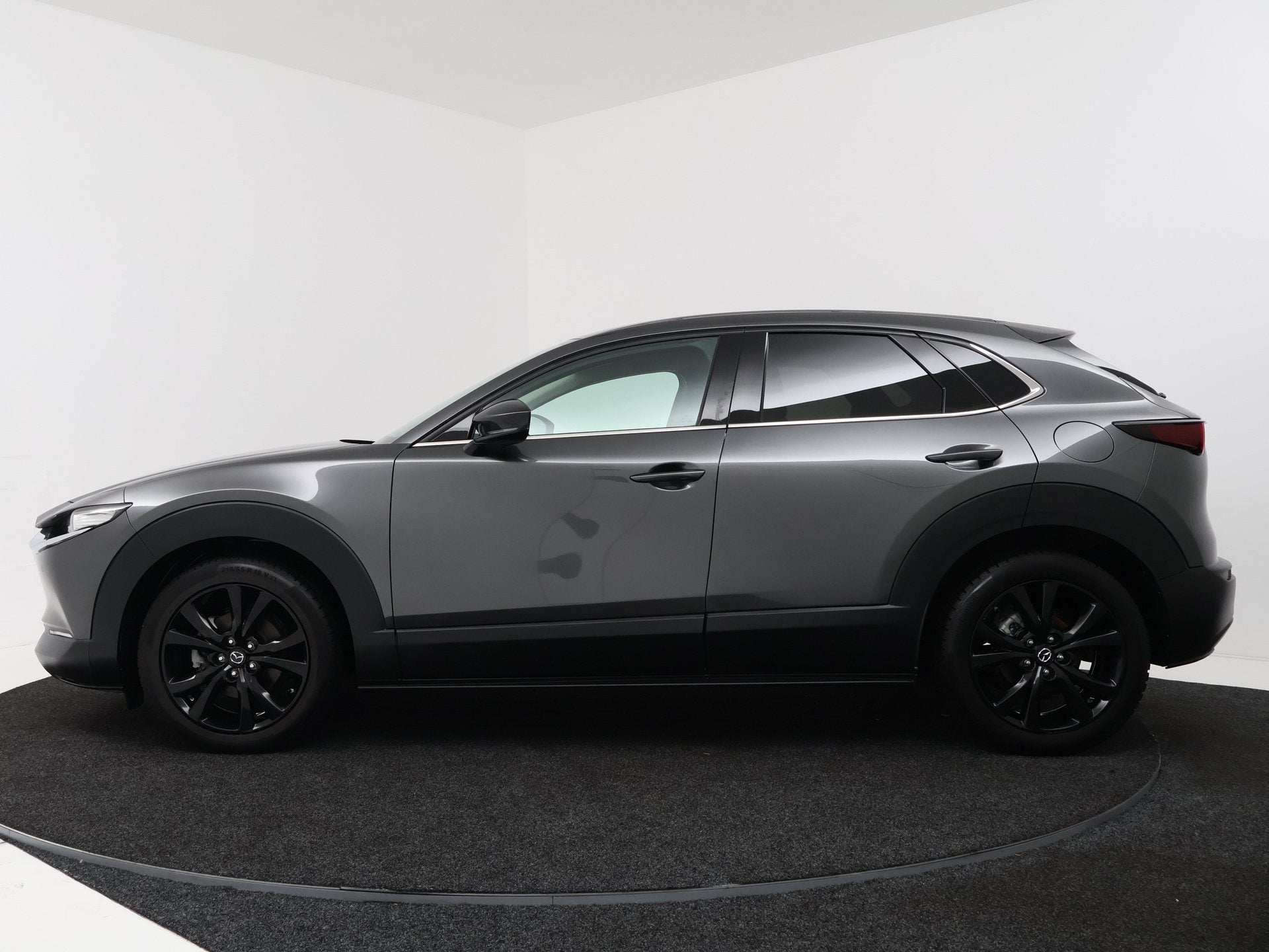 Mazda CX-30 2.0 e-SkyActiv-G M Hybrid Homura | Trekhaak | St, Voorwielaandrijving, Stof, 4 cilinders, 1353 kg