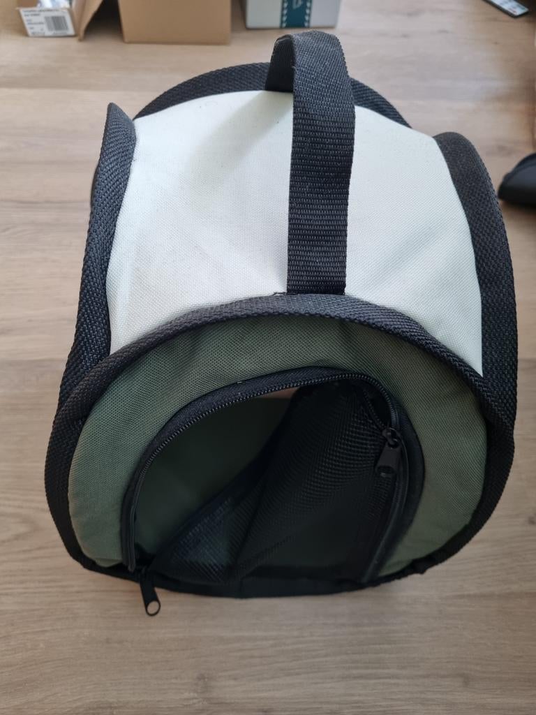 Vervoerstas voor parkiet, Ophalen