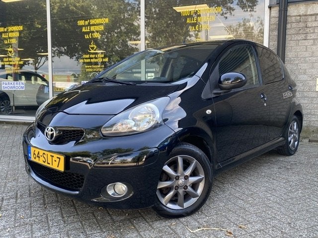 Toyota Aygo 1.0-12V Dyn. Nav. (bj 2011), Auto's, Euro 5, Gebruikt, 4 stoelen, Origineel Nederlands