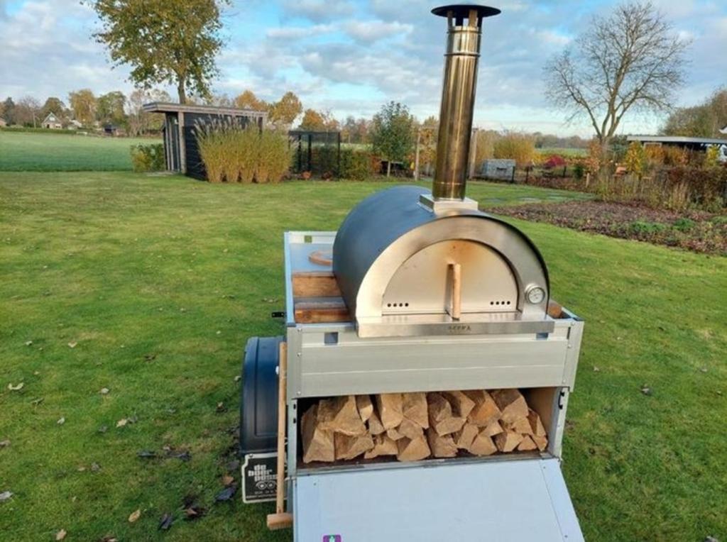 Te huur: pizzaoven, Ophalen