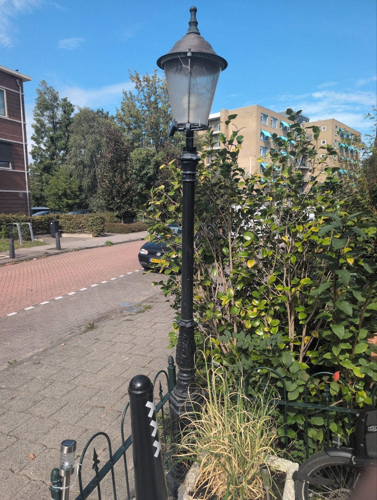 Klassieke lantaarnpaal gietijzer met koperen kap, Ophalen