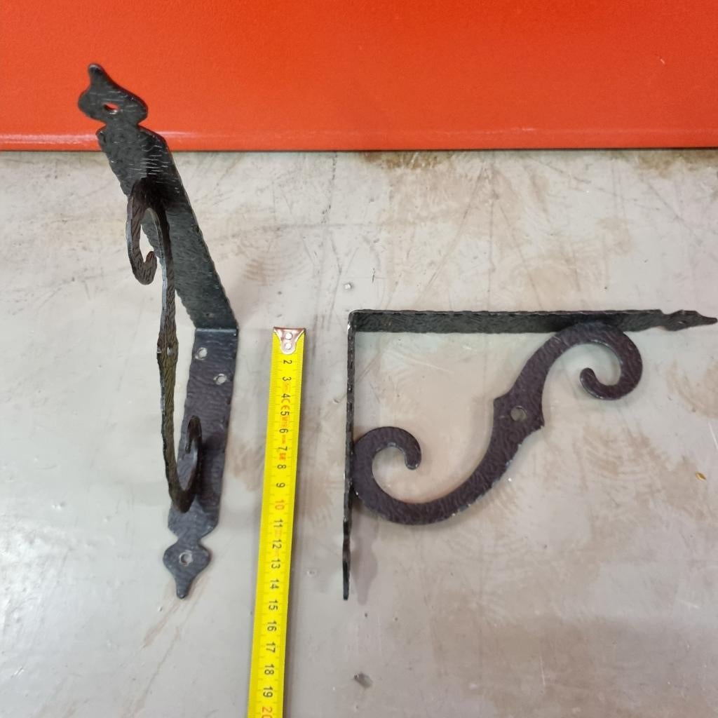 Ophangbeugels voor boekenschap, Ophalen