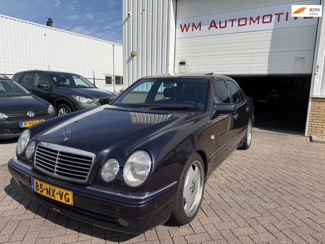 Mercedes-Benz E-klasse AMG 55 leder apk t/m 28-8-2027, Dealer onderhouden, Achterwielaandrijving, Overige kleuren, Leder