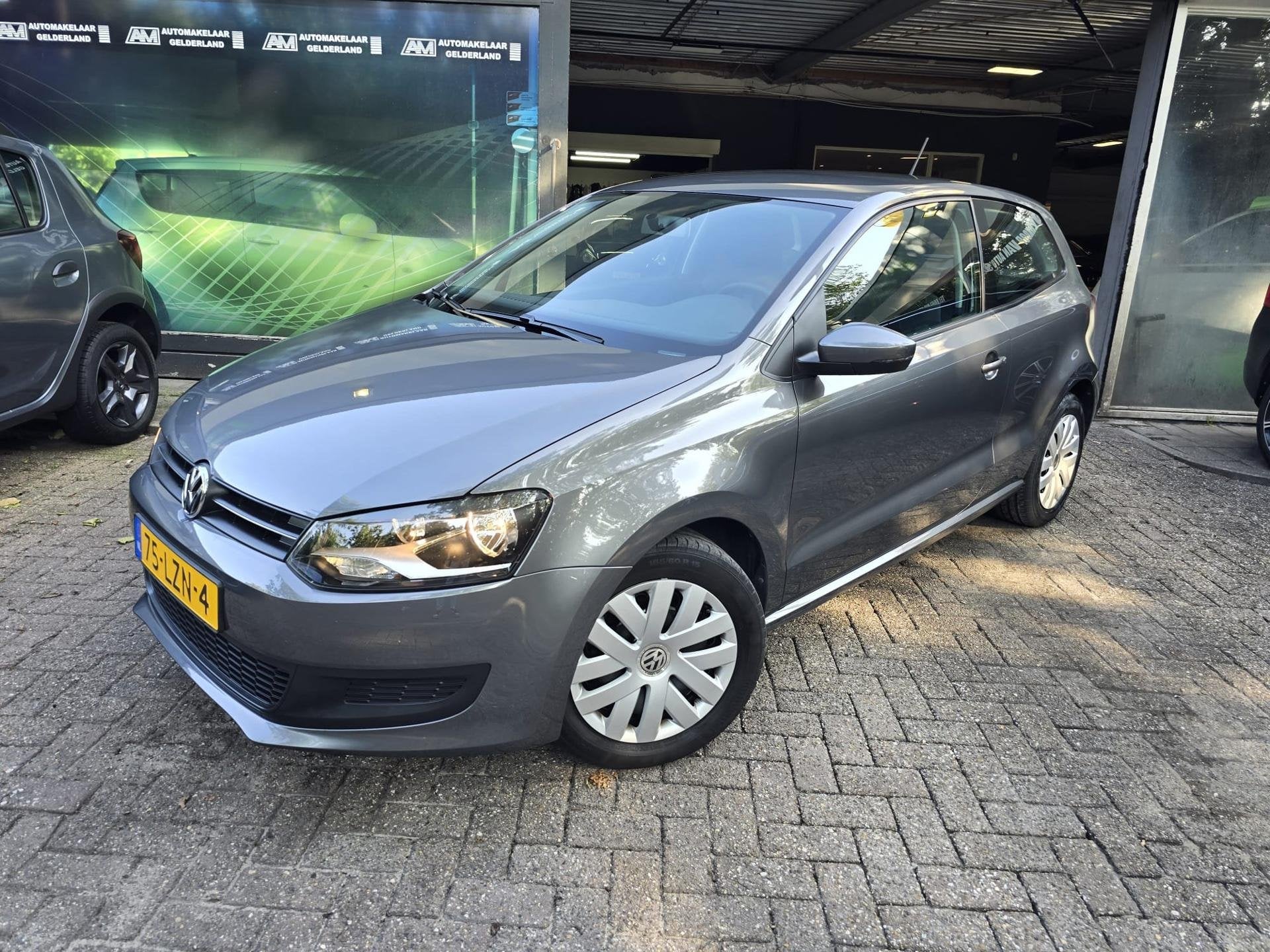 Volkswagen Polo 1.4-16V Comfortline | 1E EIGENAAR |3/6 OF 12, Auto's, Voorwielaandrijving, 4 cilinders, Traction-control, Origineel Nederlands
