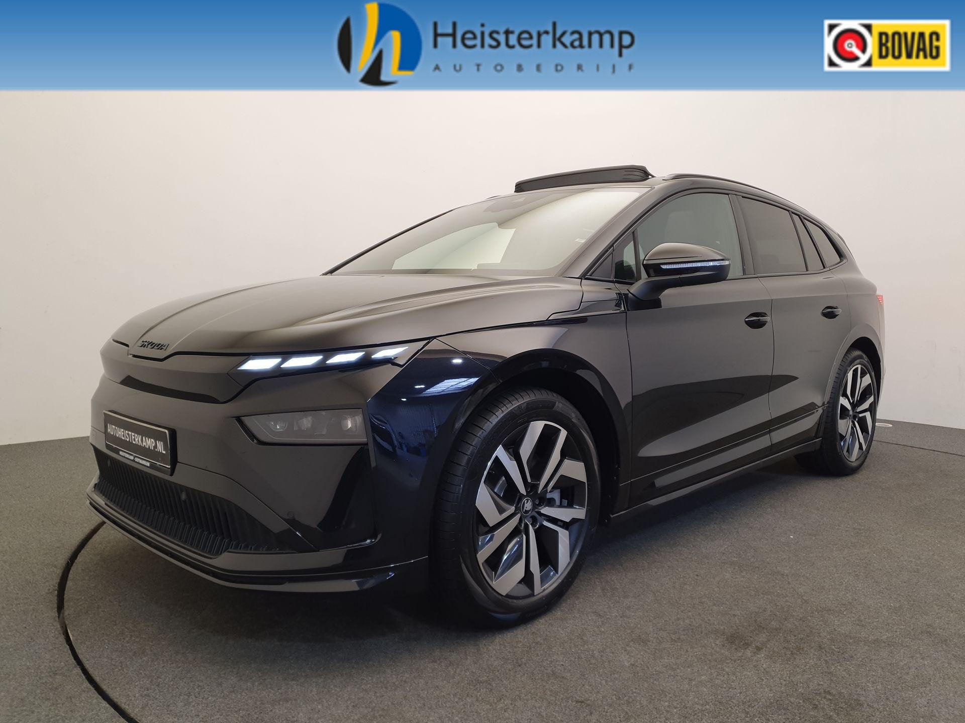 SKODA Enyaq 85 Sportline 82 kWh 286pk Wegklapbare trekhaak,, Auto's, 12 maanden, 510 min, Zwart, 82 kWh