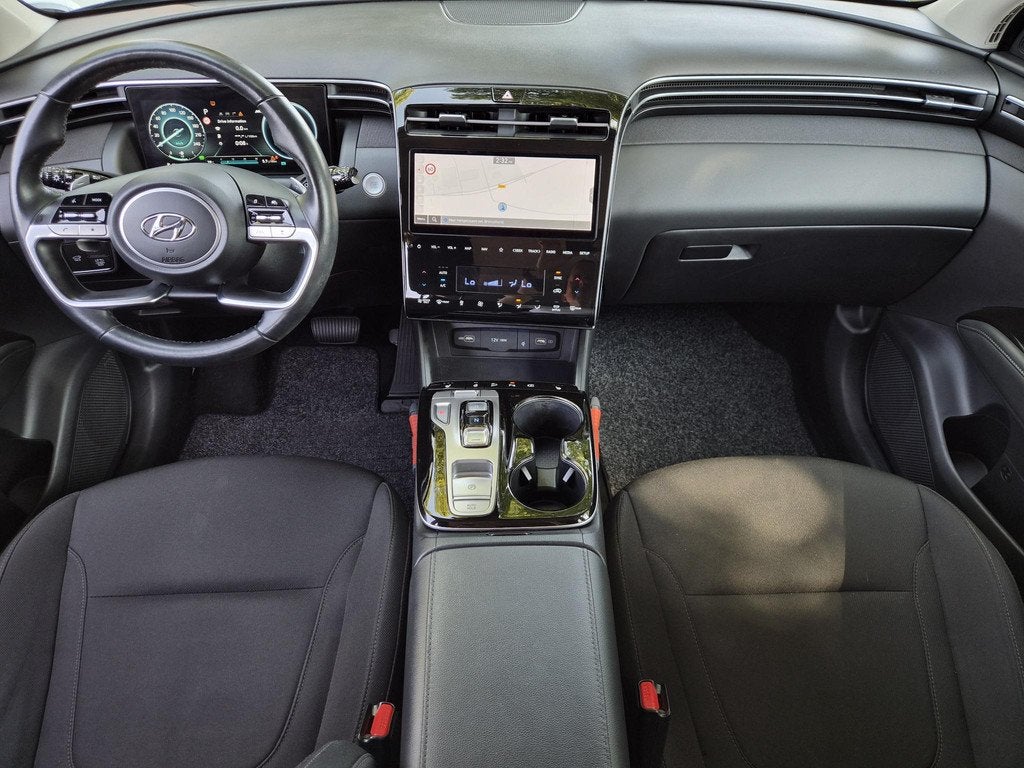 Hyundai Tucson 1.6 T-GDI HEV Comfort Smart / trekhaak vast /, Auto's, Hyundai, Stof, Gebruikt, Euro 6, 4 cilinders