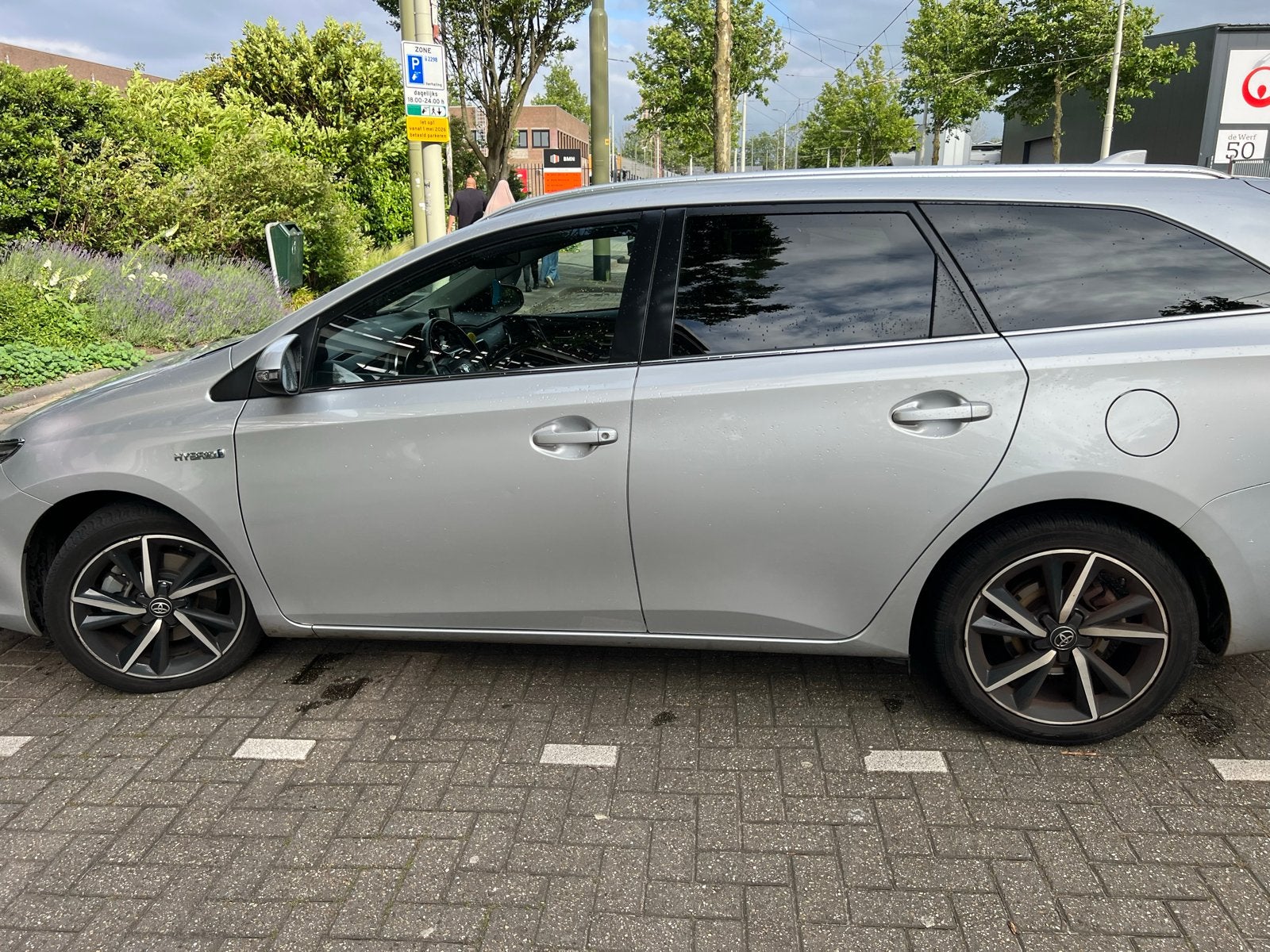 Toyota Auris 1.8 Hybrid 136pk Aut 2017 Grijs, Stof, Beige, Bluetooth, 25 km/l
