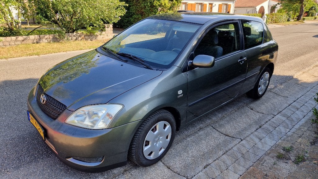 Toyota Corolla 1.4 Vvt-i 3DR Linea Terra 2003 Grijs, Auto's, Toyota, Voorwielaandrijving, 1398 cc, Corolla, Handgeschakeld