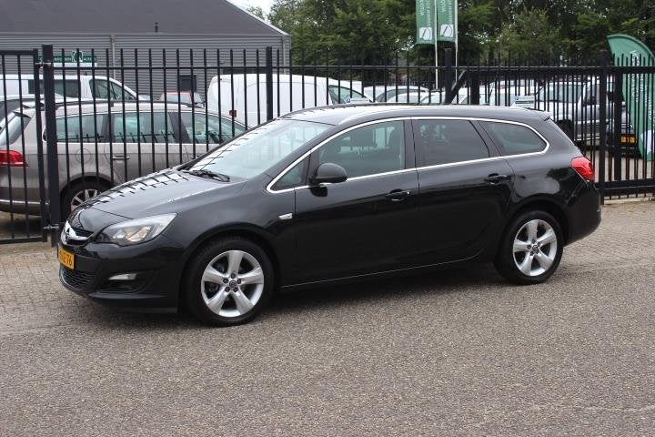 Opel Astra Sports Tourer 1.4 Turbo Berlin, Airco!, Auto's, Voorwielaandrijving, Euro 5, Stof, Gebruikt