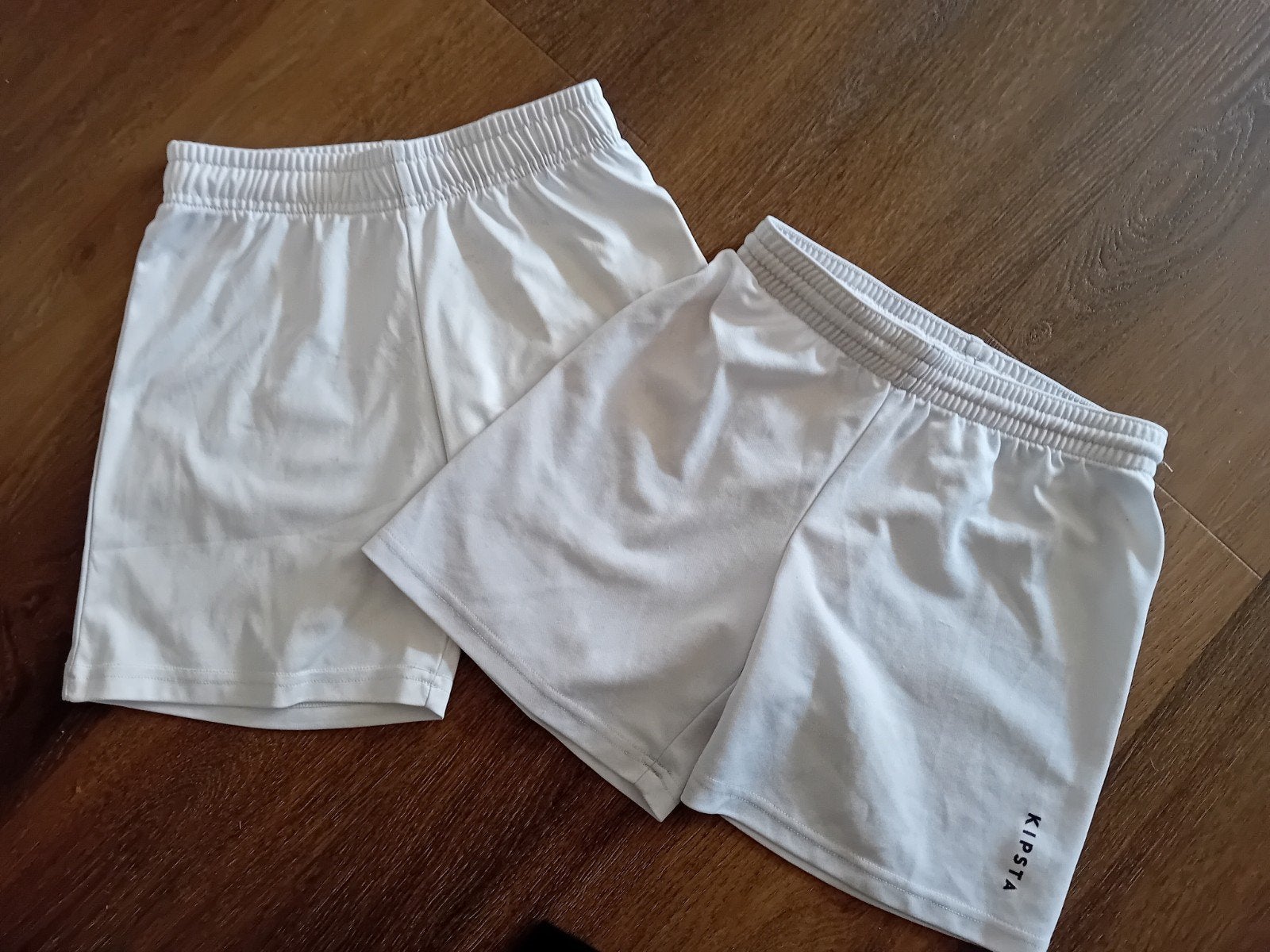 2 witte sportbroekjes 122/128 kipsta en dutchy, Maat XS of kleiner, Ophalen of Verzenden