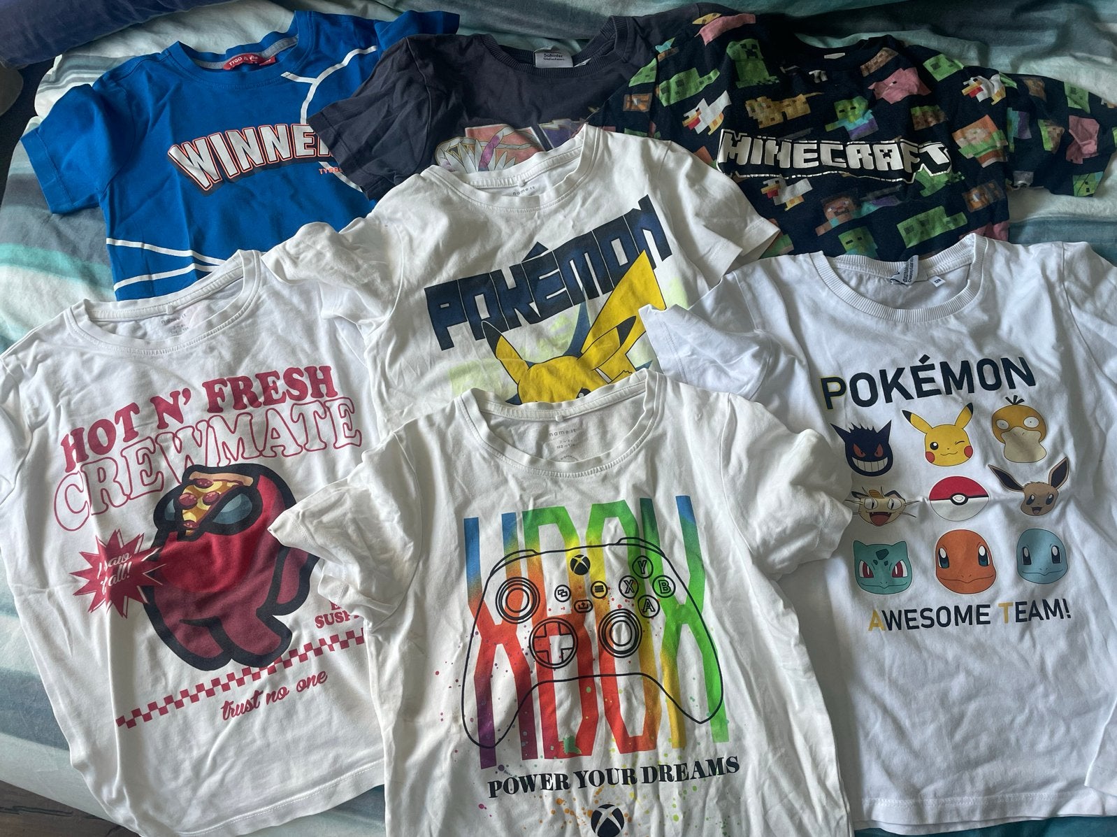 7 Gebruikte Jongens T-shirts Maat 122/128 - Pokémon, Gaming,, Ophalen of Verzenden, Gedragen