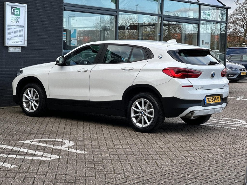 BMW X2 SDrive18i High Executive/XENON/NAVI/AUTOMAAT/NETTE ST, Auto's, BMW, Euro 6, Wit, 3 cilinders, 1390 kg