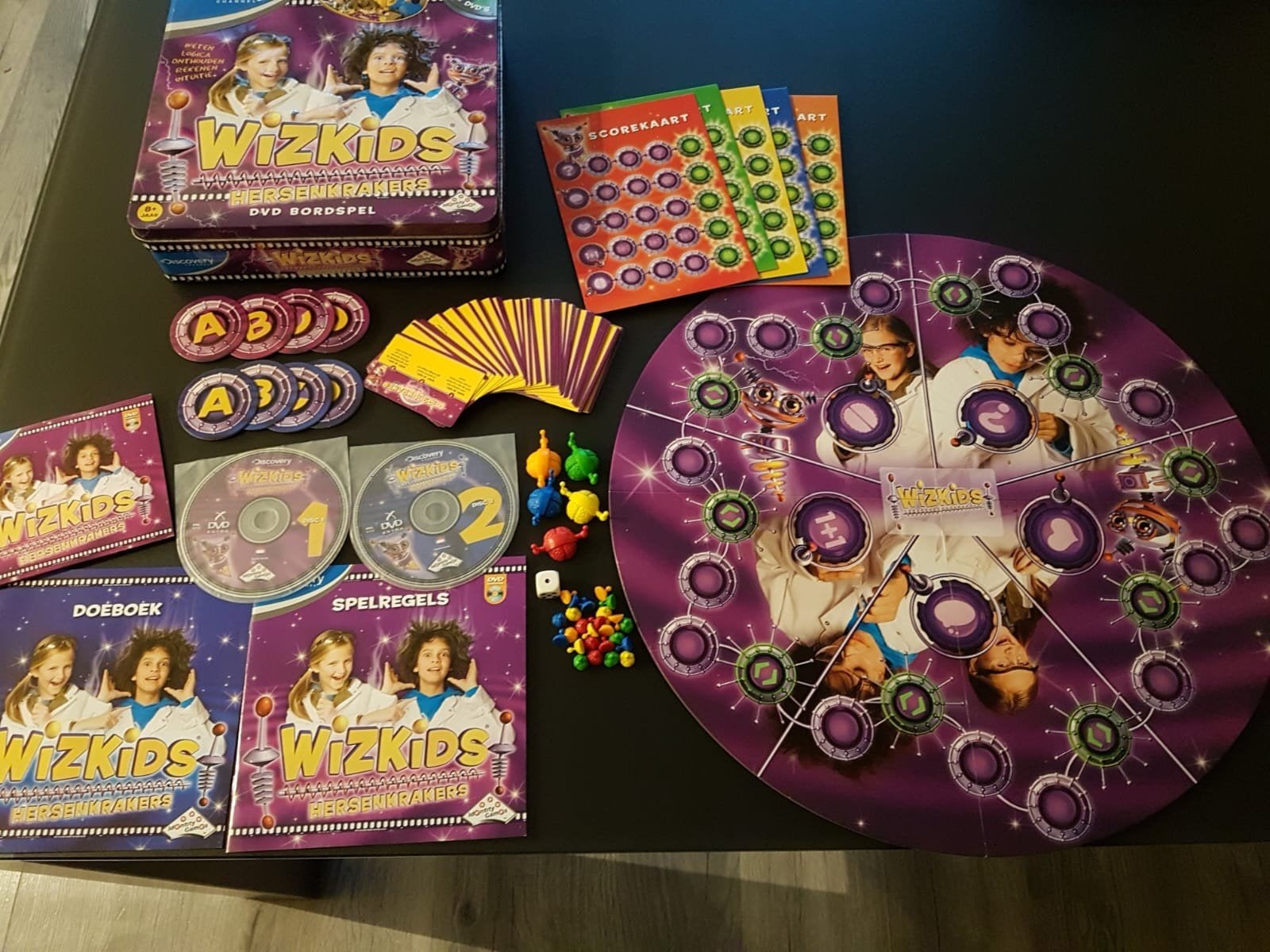 Wizkids hersenkrakers dvd bordspel. Leuk familiespel!, Ophalen of Verzenden, Zo goed als nieuw