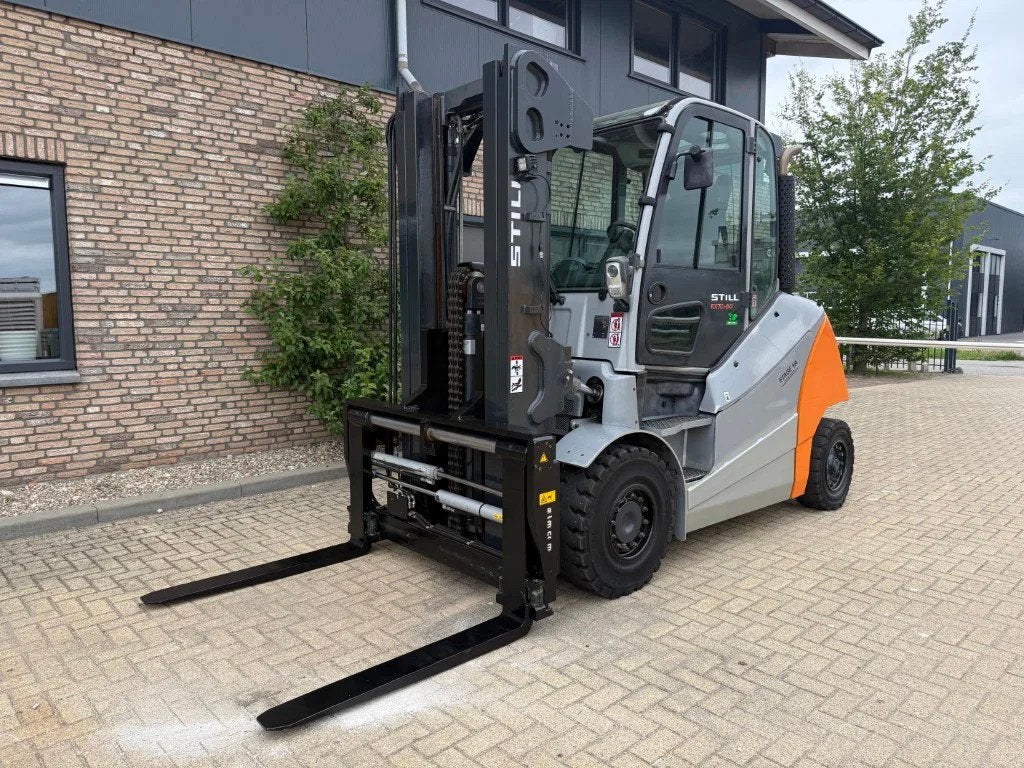 Still RX70-80 8 ton Triplex Freelift Sideshift Positioner De, Diesel, Still, Heftruck, Ophalen of Verzenden