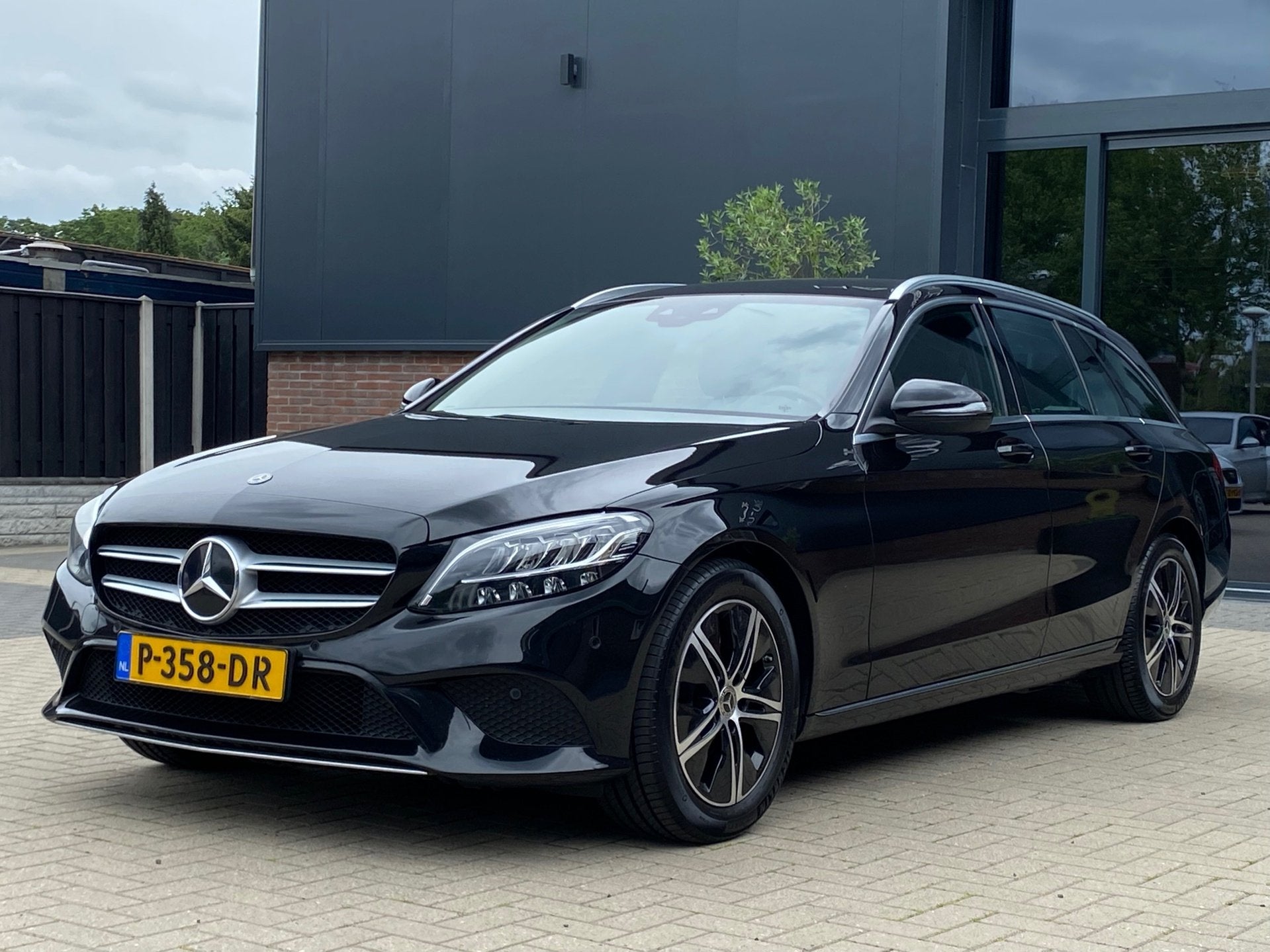 Mercedes-Benz C-klasse Estate 180 NIEUWSTAAT AUTOMAAT LED CA, Leder en Stof, Zwart, Origineel Nederlands, C-Klasse