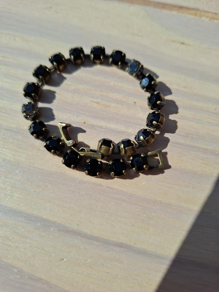 Konplott armband zwart kristal – goudkleurig – vintage, Ophalen of Verzenden, Gebruikt, Goud